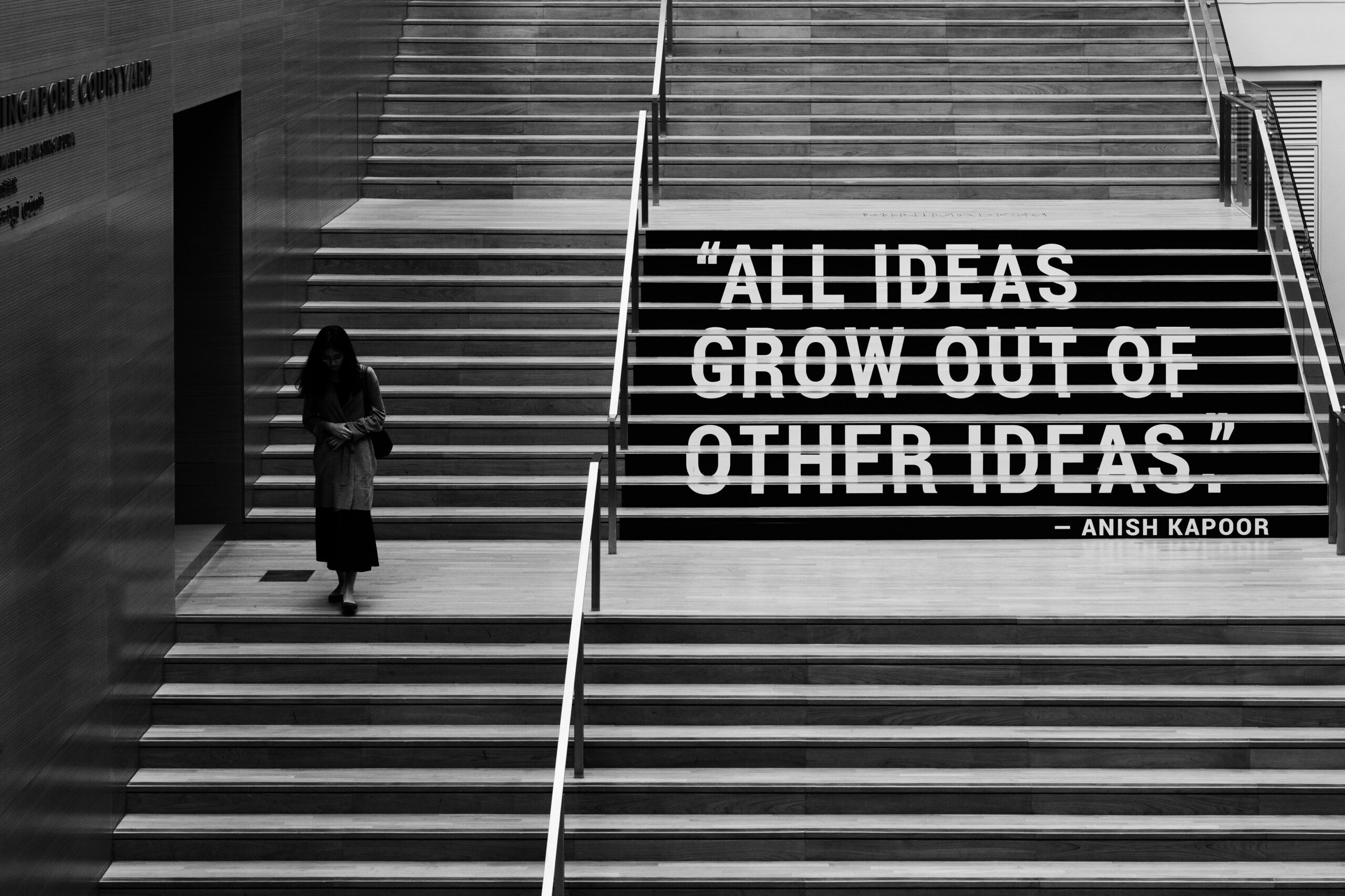 "All ideas grow out of other ideas." - Anish Kapoor quote written on a staircase