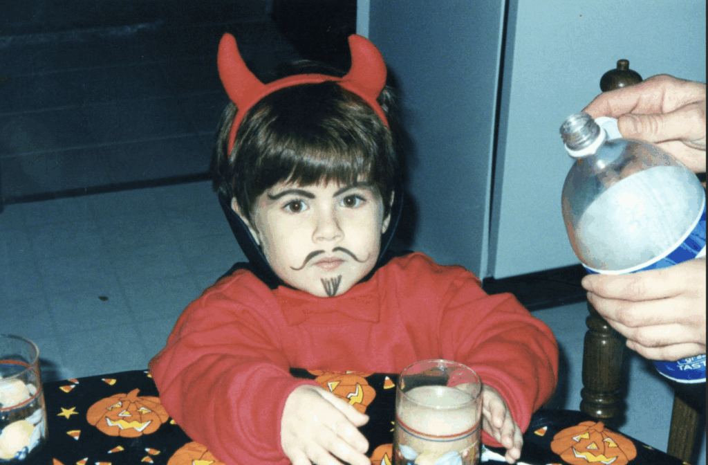 Image of Conrad when he was young, in a devil costume for Halloween